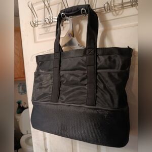 Super cool grocery picnic bag. The bottom compartment is insulated for drinks!